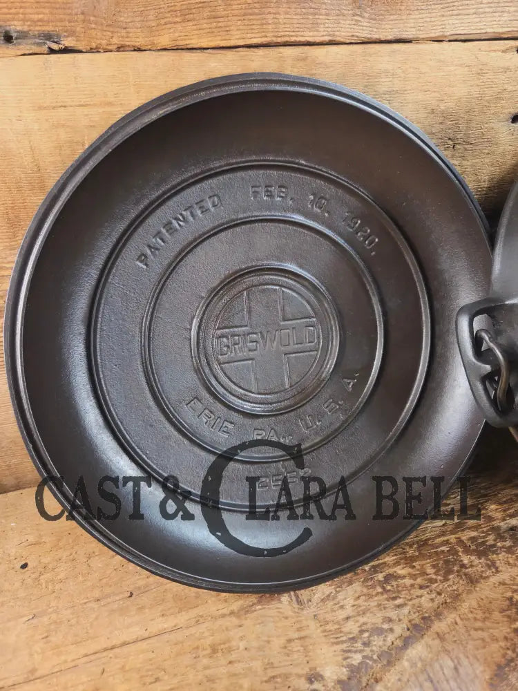 Hard to find 1920โs Griswold #9 Dutch Oven w/ Slant Logo p/n 834 H and p/n 2552 A matching block lid Dutch Ovens