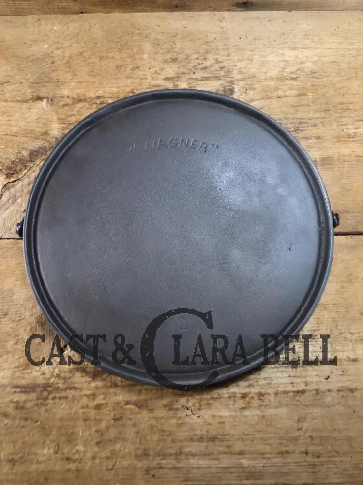 Hard to Find 1st Series 1890’s Wagner ’Arc’ logo #12 Bailed Griddle. Awesome barely used condition for its age. Perfect