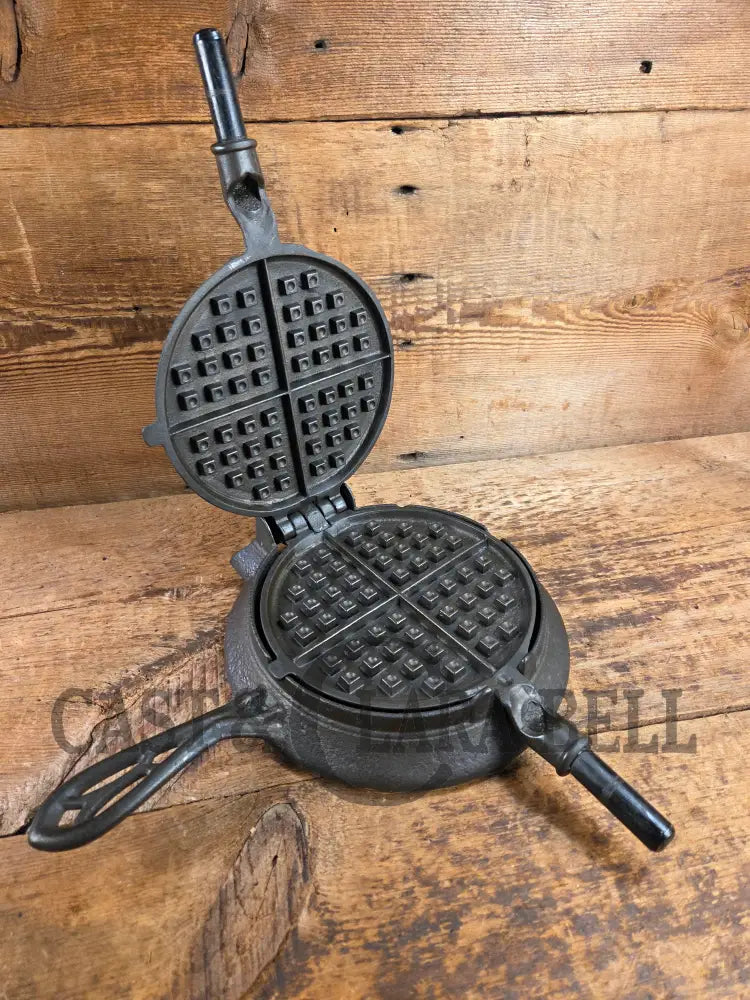 Hard to find and Beautiful!! 1880’s Griswold No. 7 Waffle Iron with low button hinge base. Don’t miss this one Waffle