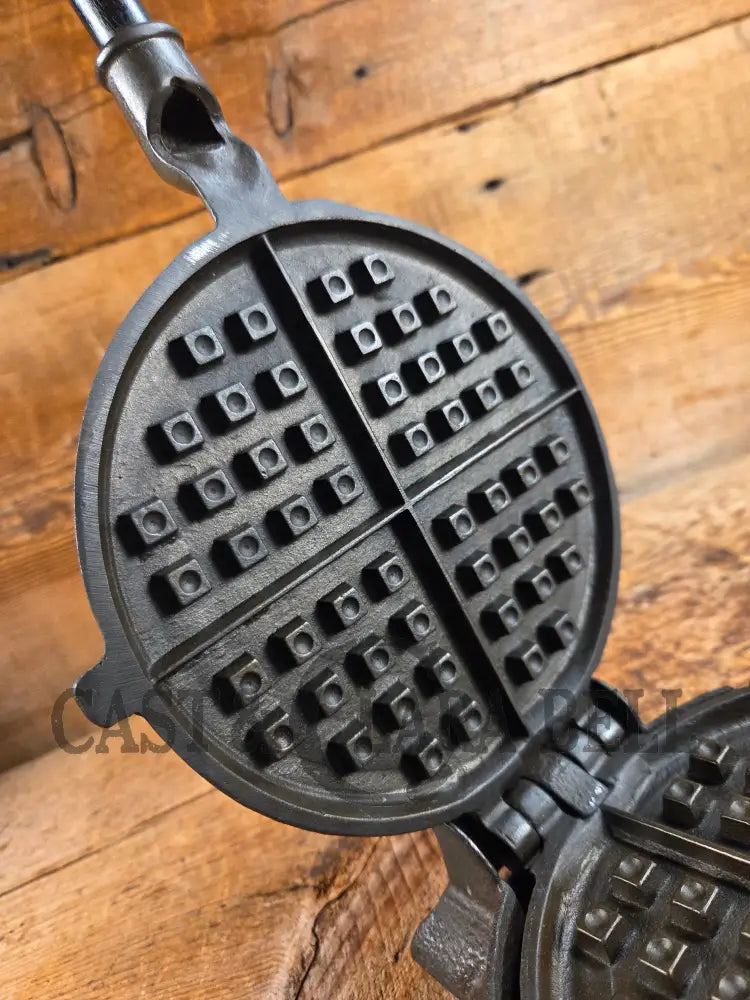 Hard to find and Beautiful!! 1880’s Griswold No. 7 Waffle Iron with low button hinge base. Don’t miss this one Waffle
