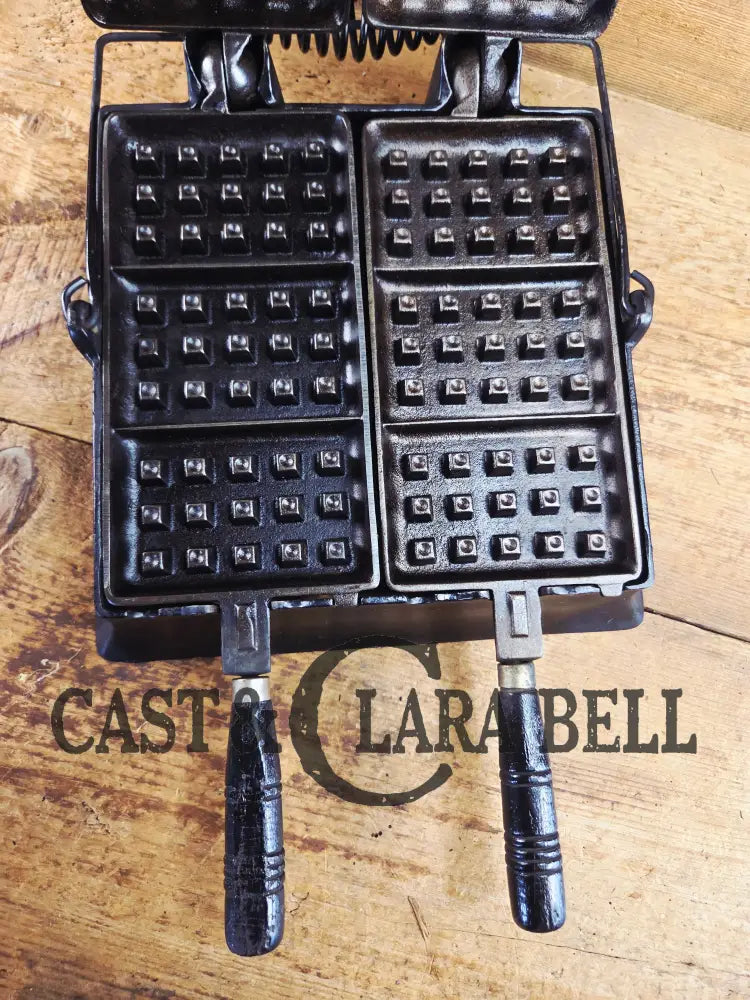 Hard to find and priced to sell! 1910’s Era Wagner Waffle Iron with matching bailed base. Don’t miss this one! Waffle