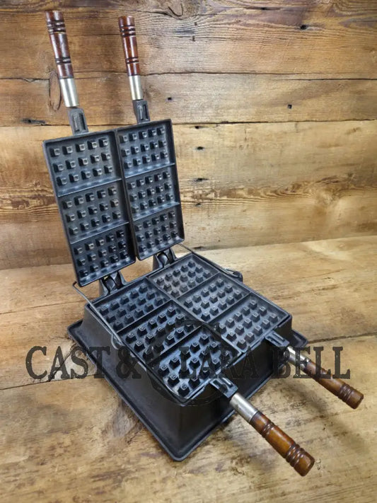 Hard to find showstopper! 1910βs Era Wagner Waffle Iron with matching bailed base. Donβt miss this one! Waffle Iron