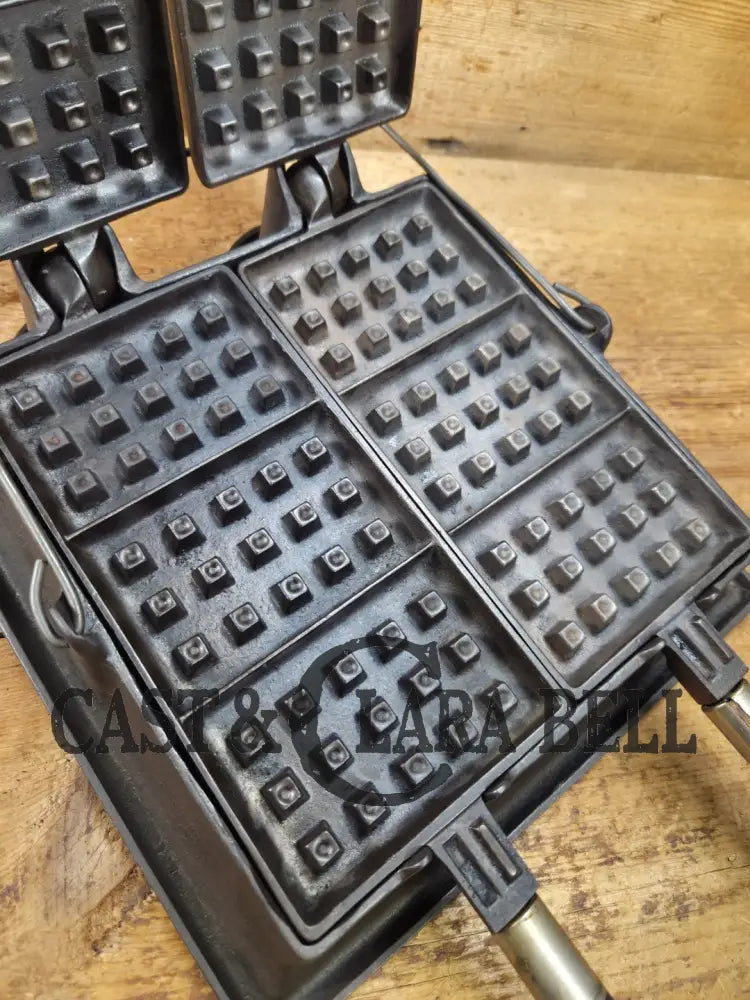 Hard to find showstopper! 1910’s Era Wagner Waffle Iron with matching bailed base. Don’t miss this one! Waffle Iron