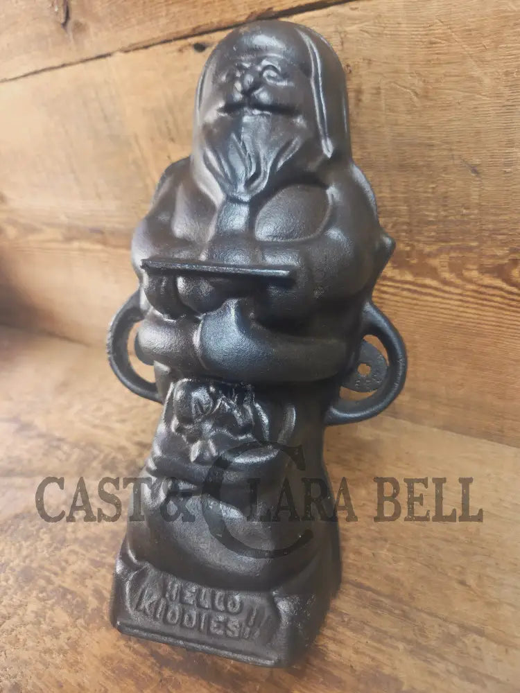 Ho Ho Hold the SHOW!! The Authentic #897/898 Griswold SANTA Cake Mold (Hello Kiddies!). Many copies are out there see