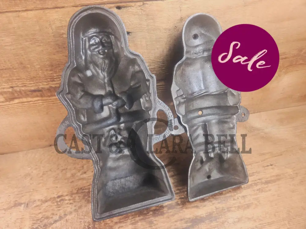 Ho Ho Hold the SHOW!! The Authentic #897/898 Griswold SANTA Cake Mold (Hello Kiddies!). Many copies are out there see