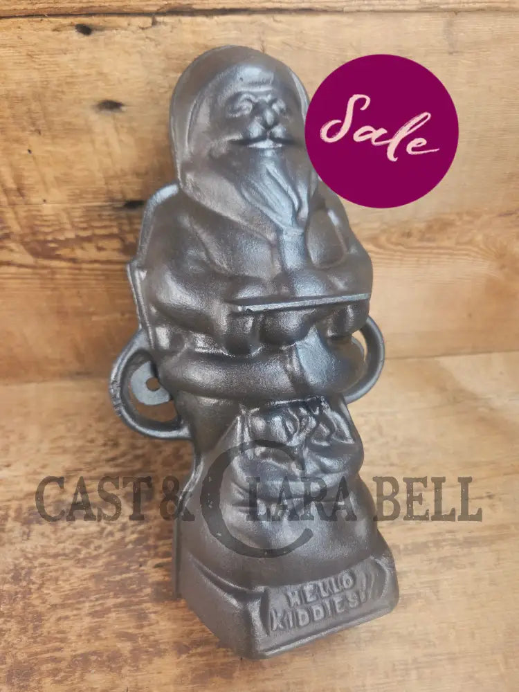 Ho Ho Hold the SHOW!! The Authentic #897/898 Griswold SANTA Cake Mold (Hello Kiddies!). Many copies are out there see