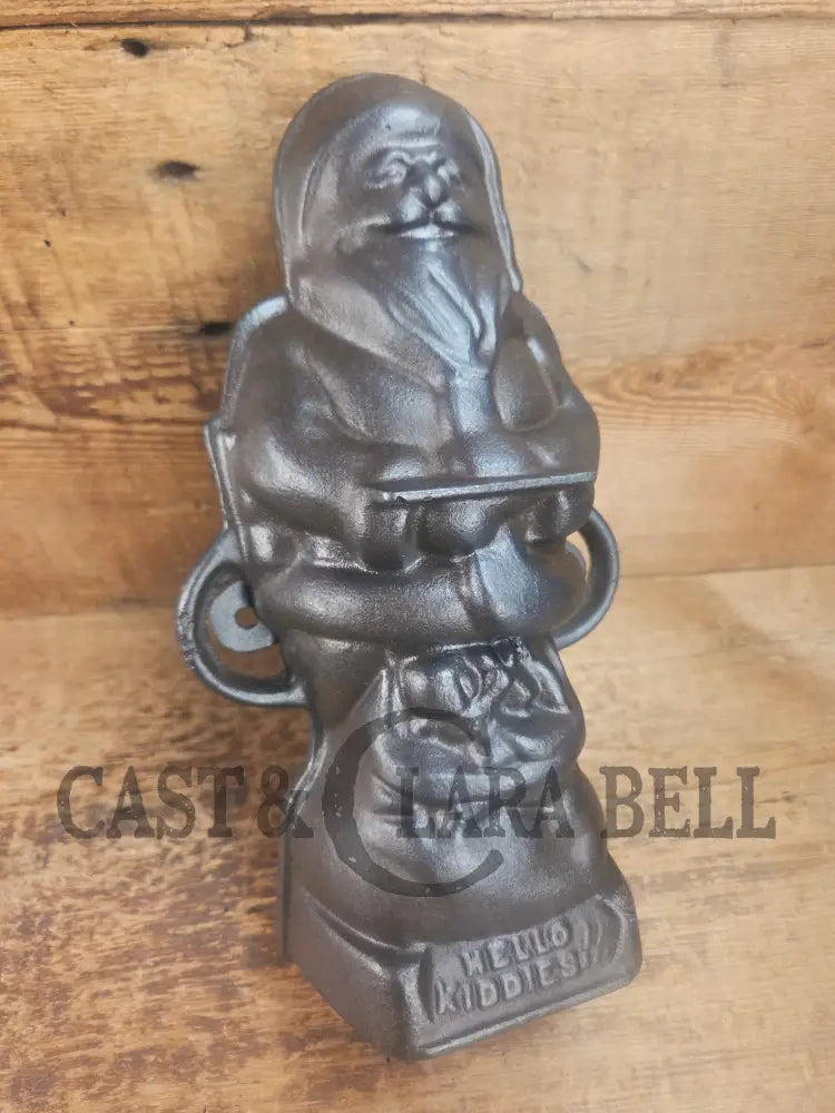 Ho Ho Hold the SHOW!! The Authentic #897/898 Griswold SANTA Cake Mold (Hello Kiddies!). Many copies are out there see