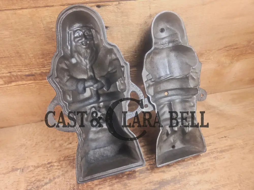 Ho Ho Hold the SHOW!! The Authentic #897/898 Griswold SANTA Cake Mold (Hello Kiddies!). Many copies are out there see