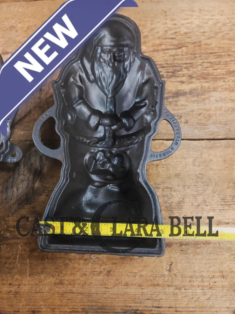 Ho Ho Hold the SHOW!! The Authentic #897/898 Griswold SANTA Cake Mold (Hello Kiddies!). Many copies are out there see