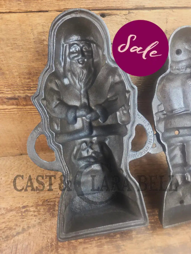 Ho Ho Hold the SHOW!! The Authentic #897/898 Griswold SANTA Cake Mold (Hello Kiddies!). Many copies are out there see
