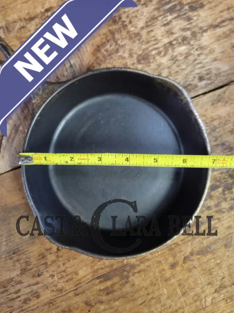 HTF! 1924 Wagner Ware #4 Cast Iron Skillet with Heat Ring 1054. Plating outside black iron inside. Beautiful patina!