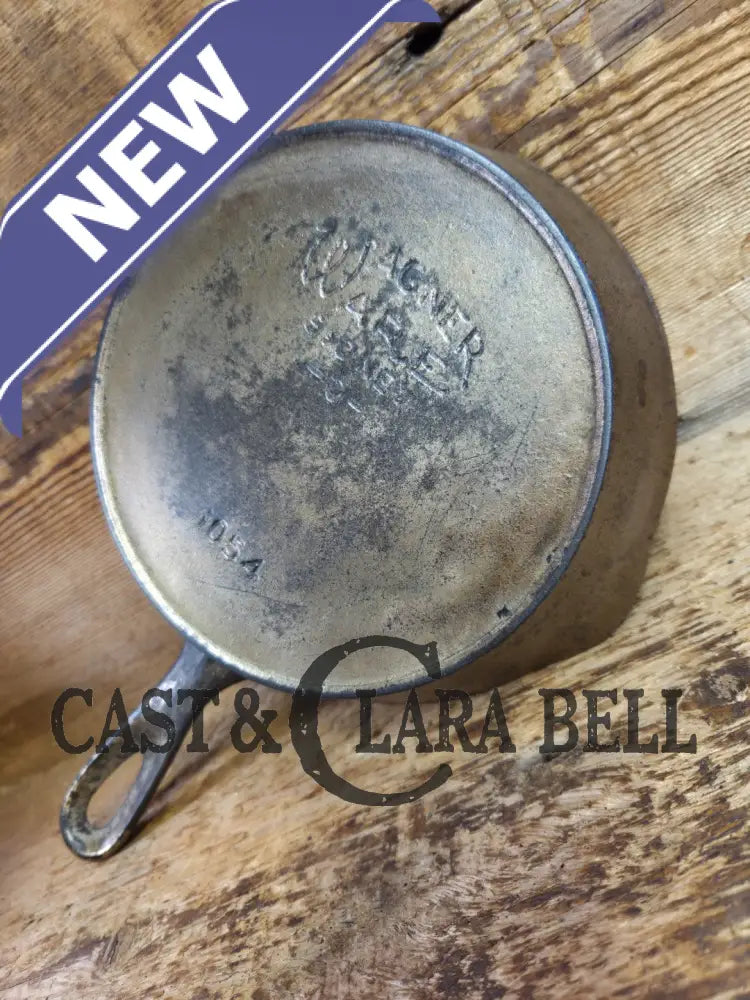 HTF! 1924 Wagner Ware #4 Cast Iron Skillet with Heat Ring 1054. Plating outside black iron inside. Beautiful patina!