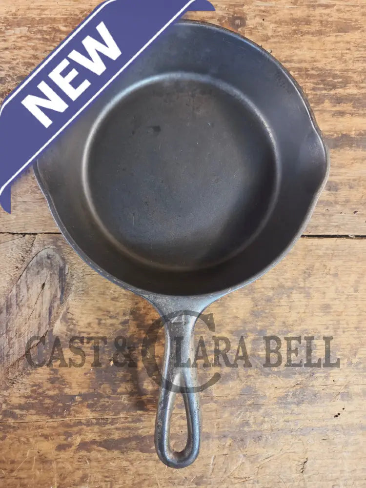 HTF! 1924 Wagner Ware #4 Cast Iron Skillet with Heat Ring 1054. Plating outside black iron inside. Beautiful patina!