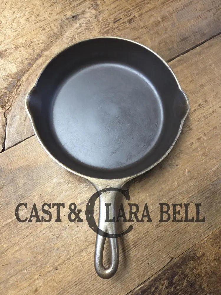 HTF 1924 Wagner Ware Sidney -O- #6 Skillet with Heat Ring 1056. Nickel outside finish black iron interior. Beautiful