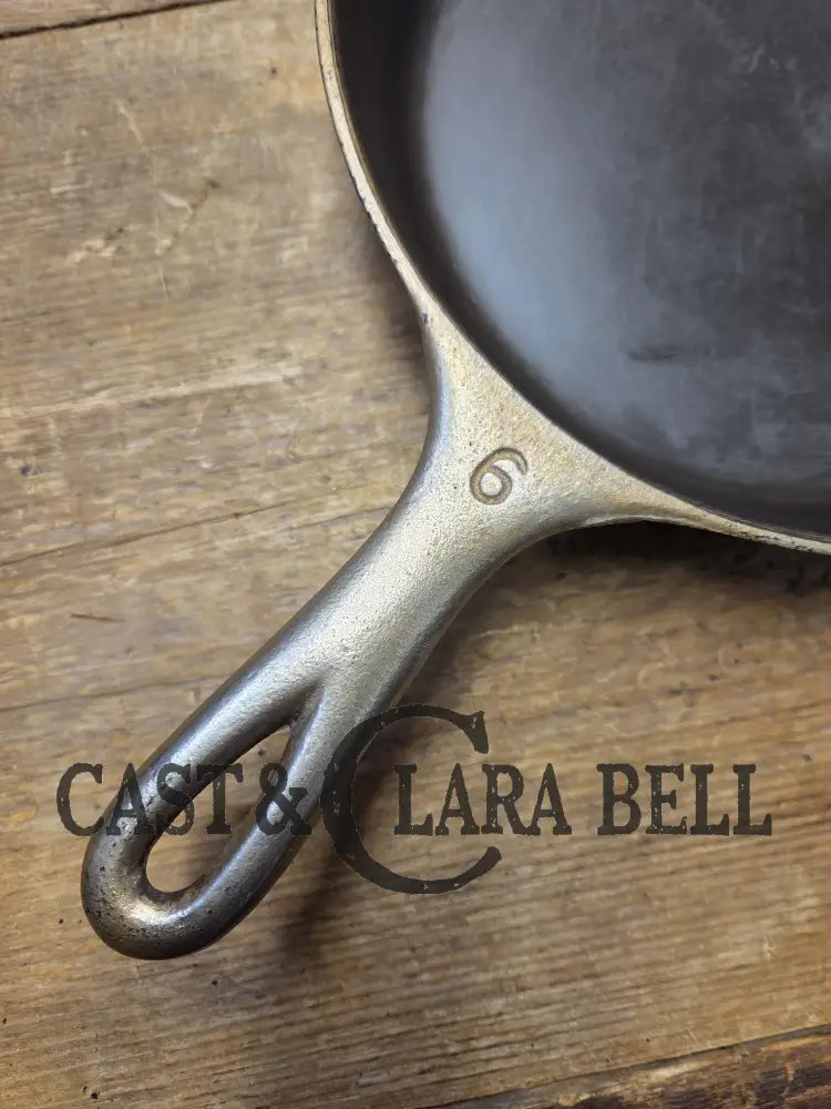 HTF 1924 Wagner Ware Sidney -O- #6 Skillet with Heat Ring 1056. Nickel outside finish black iron interior. Beautiful