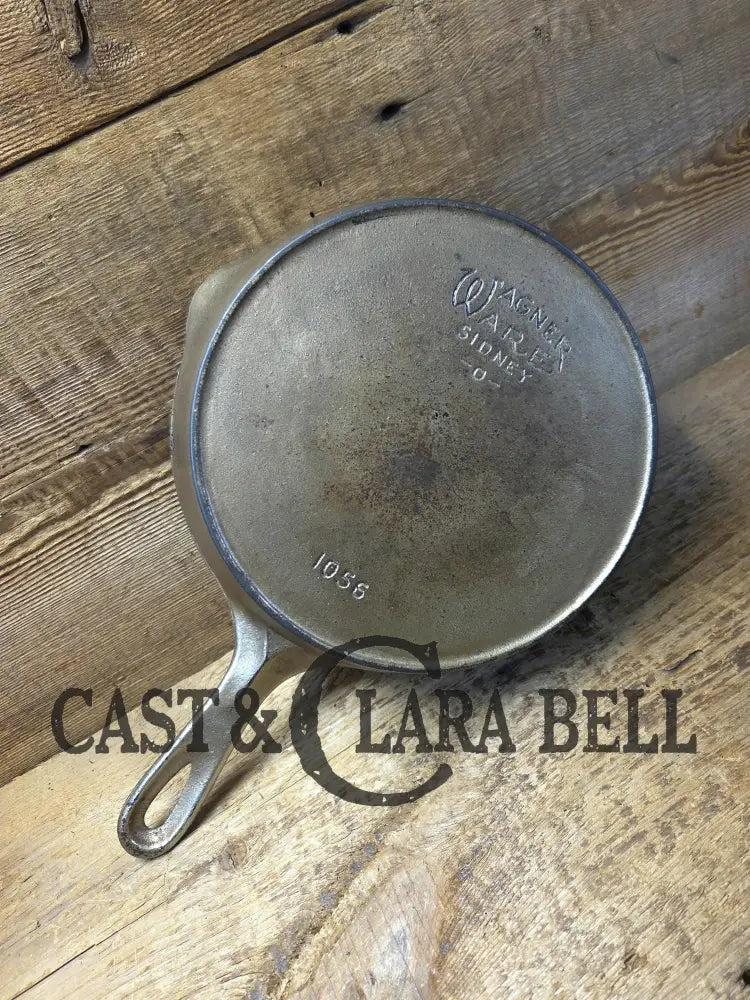 HTF 1924 Wagner Ware Sidney -O- #6 Skillet with Heat Ring 1056. Nickel outside finish black iron interior. Beautiful