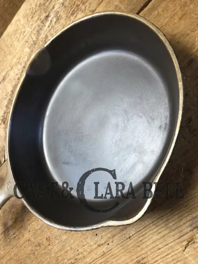 HTF 1924 Wagner Ware Sidney -O- #6 Skillet with Heat Ring 1056. Nickel outside finish black iron interior. Beautiful