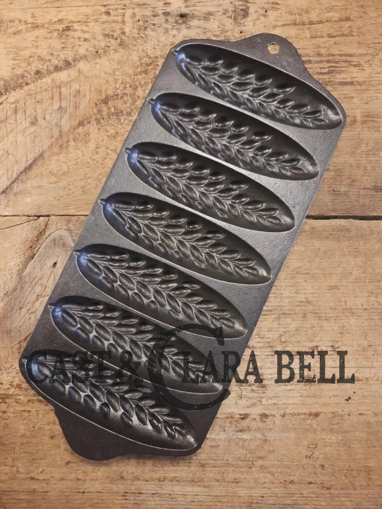 HTF 1930’s Griswold made Puritan # 1270 Wheat Stick Pan p/n 1513. Made for Sears & Roebuck department stores. Restored