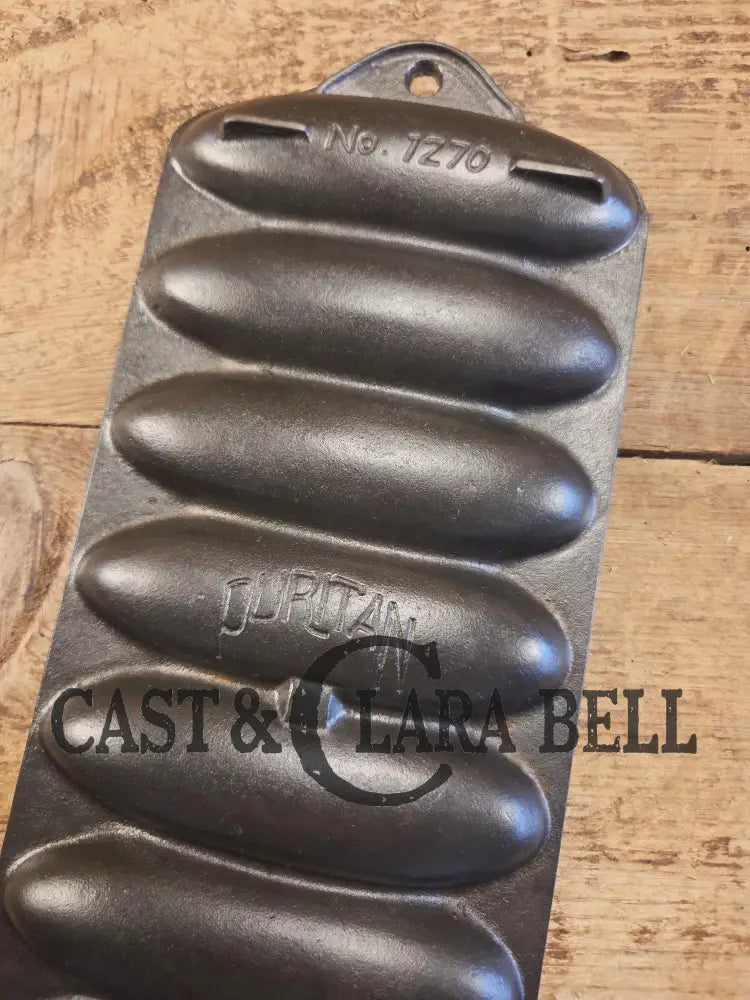 HTF 1930βs Griswold made Puritan # 1270 Wheat Stick Pan p/n 1513. Made for Sears & Roebuck department stores. Restored