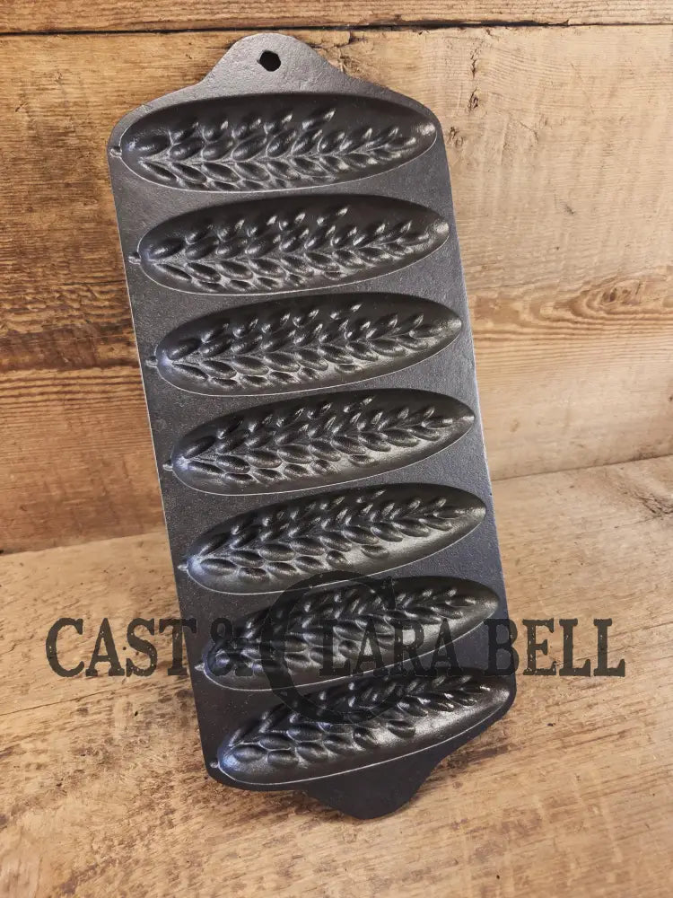 HTF 1930βs Griswold made Puritan # 1270 Wheat Stick Pan p/n 1513. Made for Sears & Roebuck department stores. Restored