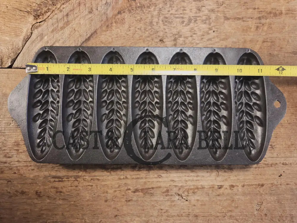 HTF 1930βs Griswold made Puritan # 1270 Wheat Stick Pan p/n 1513. Made for Sears & Roebuck department stores. Restored