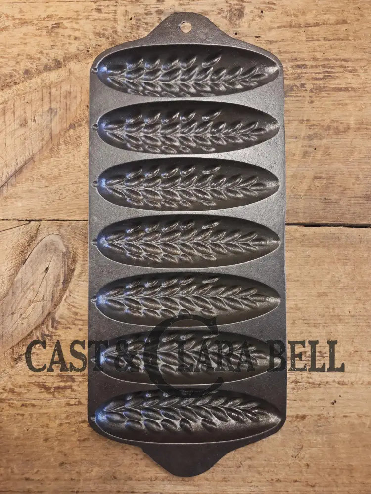 HTF 1930βs Griswold made Puritan # 1270 Wheat Stick Pan p/n 1513. Made for Sears & Roebuck department stores. Restored