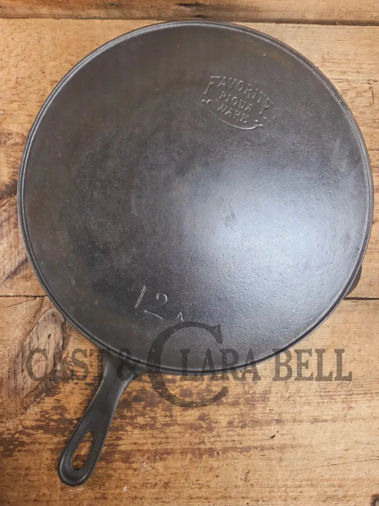 HUGE and hard to find 1910βs Early Favorite Piqua Ware #12 Cast Iron Skillet Smiley Logo great for gas or coil tops!