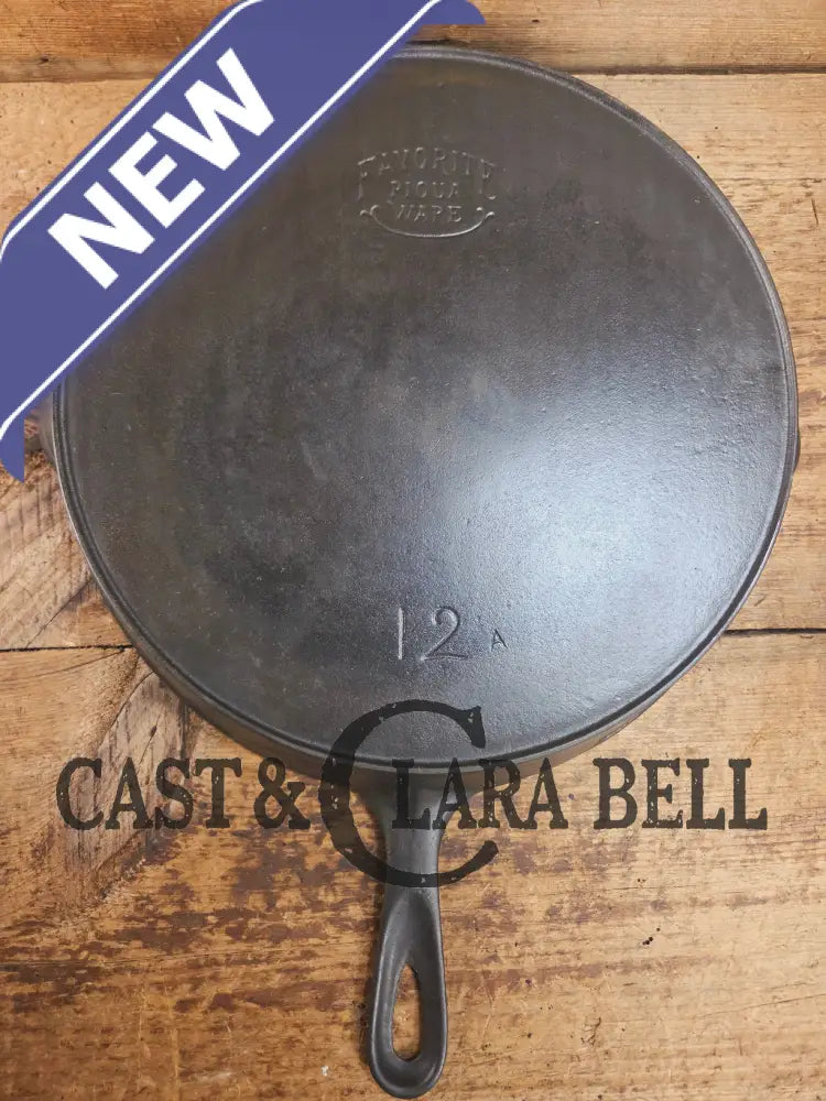 HUGE and hard to find 1910βs Early Favorite Piqua Ware #12 Cast Iron Skillet Smiley Logo great for gas or coil tops!