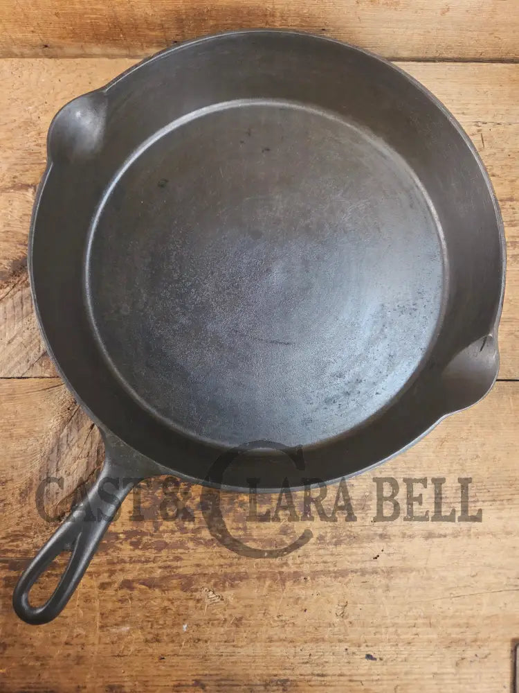 HUGE and hard to find 1910βs Early Favorite Piqua Ware #12 Cast Iron Skillet Smiley Logo great for gas or coil tops!