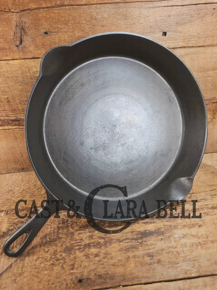 HUGE and hard to find 1910βs Early Favorite Piqua Ware #12 Cast Iron Skillet Smiley Logo great for gas or coil tops!