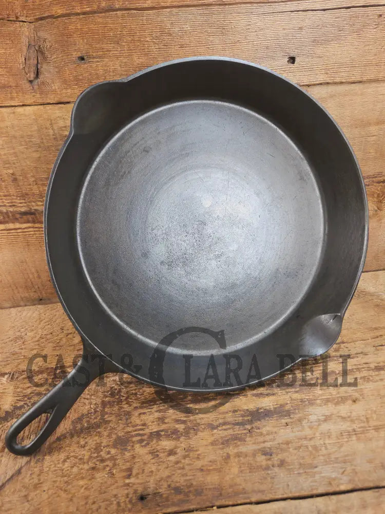 HUGE and hard to find 1910βs Early Favorite Piqua Ware #12 Cast Iron Skillet Smiley Logo great for gas or coil tops!