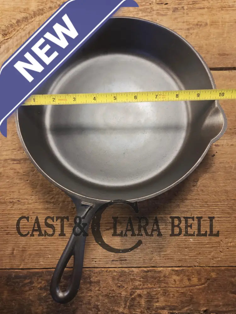 I love this skillet! Classic 1910’s Lodge Raised #7 Heat Ring Single Notch. Light sleek and ready to cook with! Skillet
