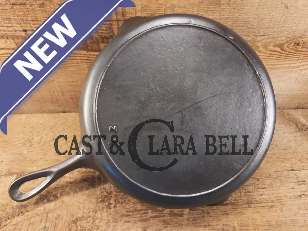 I love this skillet! Classic 1910’s Lodge Raised #7 Heat Ring Single Notch. Light sleek and ready to cook with! Skillet