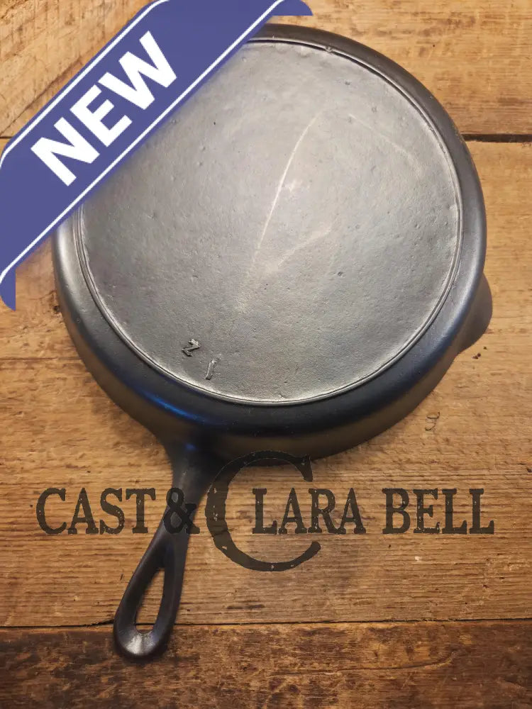 I love this skillet! Classic 1910’s Lodge Raised #7 Heat Ring Single Notch. Light sleek and ready to cook with! Skillet