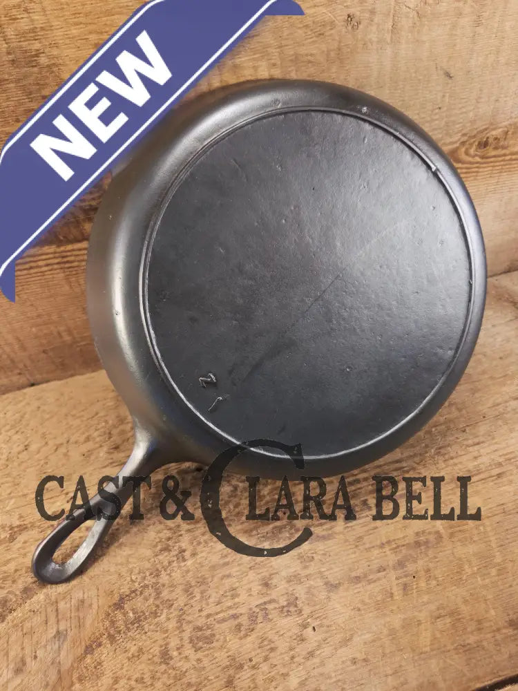 I love this skillet! Classic 1910’s Lodge Raised #7 Heat Ring Single Notch. Light sleek and ready to cook with! Skillet
