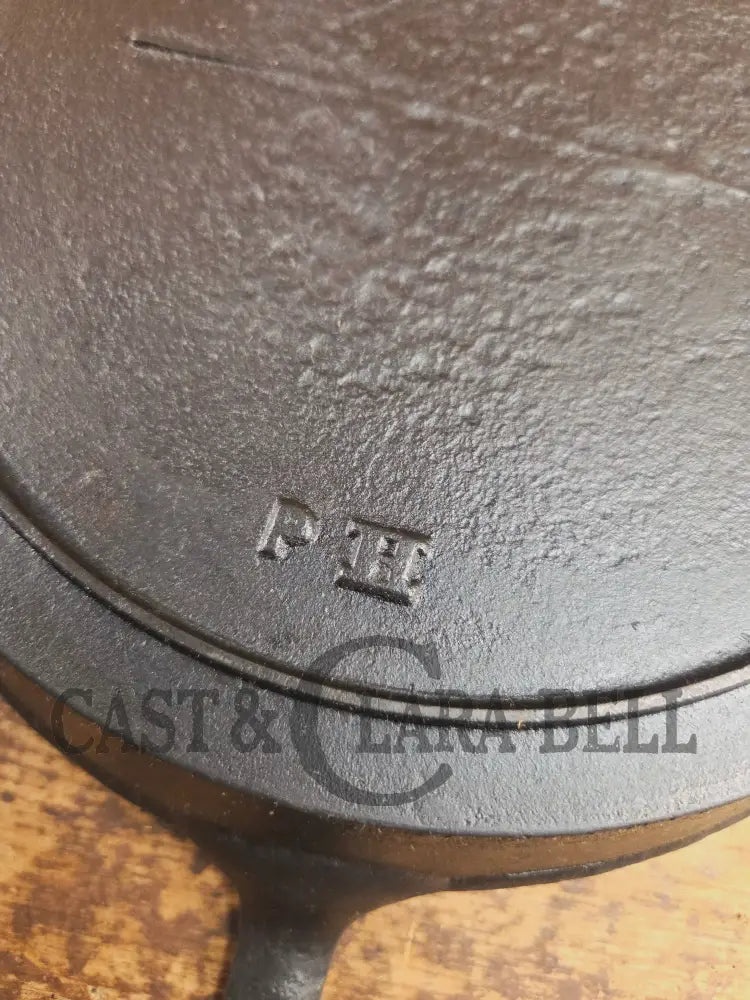 Late 1800’s Semi Fancy handled #9 cast iron skillet with Raised PH on the bottom. Beautiful skillet amazing daily user!
