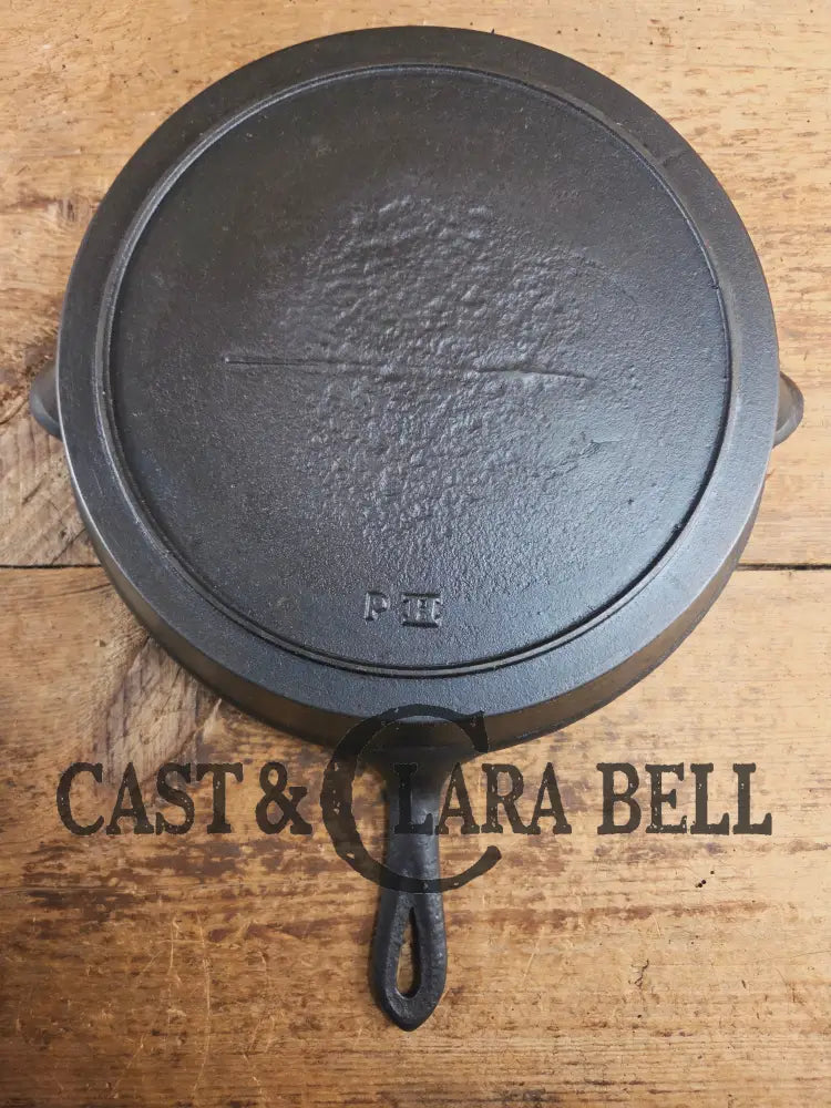 Late 1800’s Semi Fancy handled #9 cast iron skillet with Raised PH on the bottom. Beautiful skillet amazing daily user!