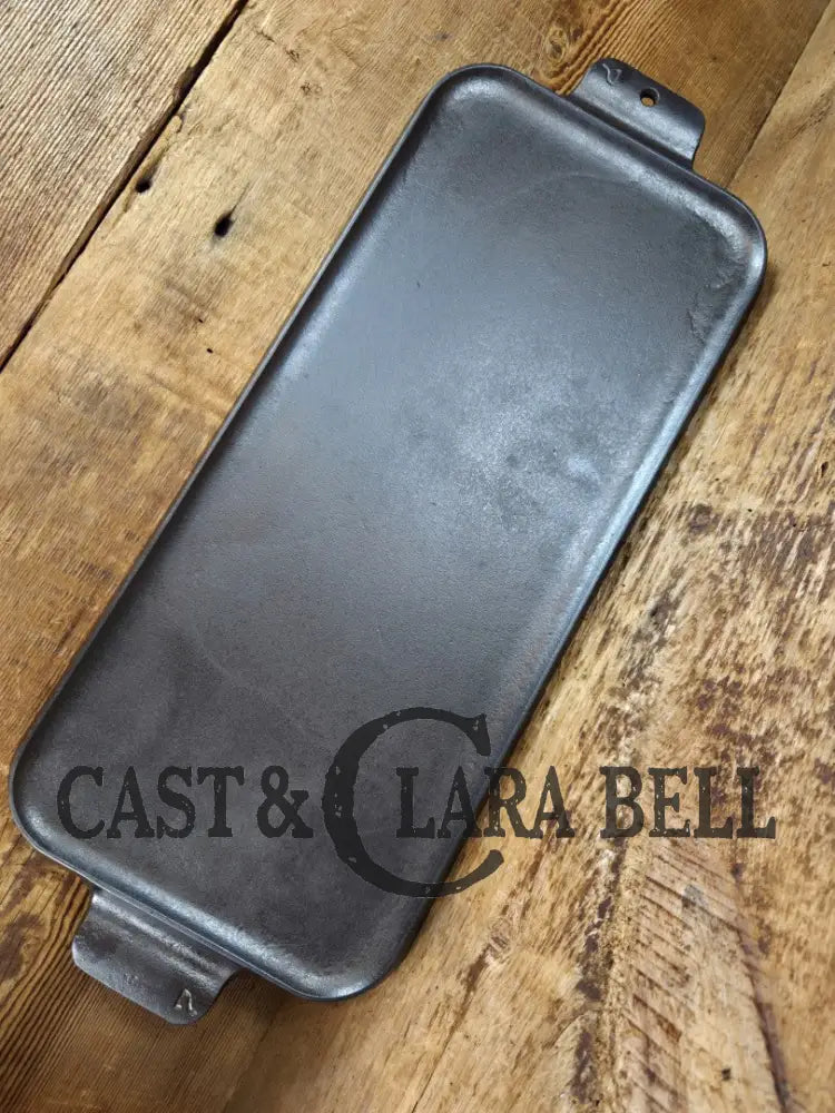LOVE it. Great gift! 1930βs Small Block Logo Griswold #7 Cast Iron Long Griddle 907 Griddle