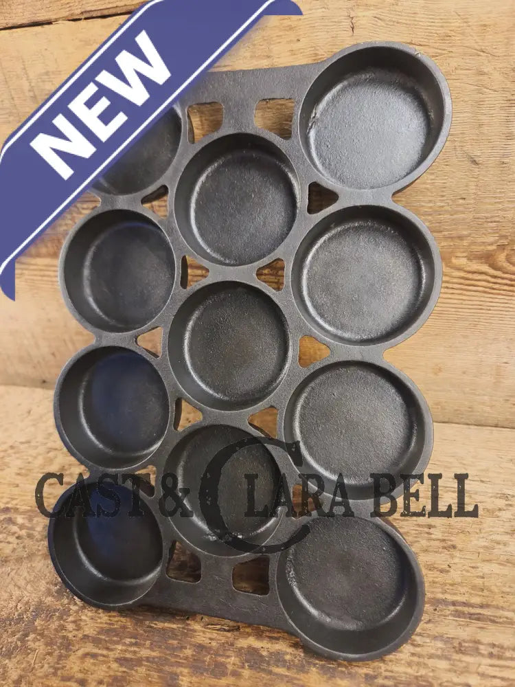 Most rare variation (Rarity 6) Fully Marked Griswold No. 1 Gem Pan Block Logo 11 cup p/n 940. This piece is flat out