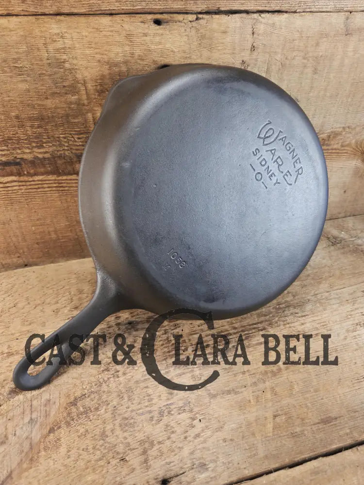 Wagner Ware #8 Cast Iron Skillet with Stylized Logo and Smooth Bottom 1058 M SC24 Skillet