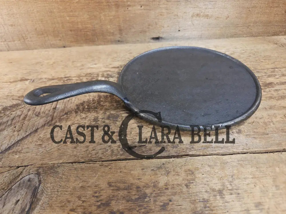 Piece of American history. Late 1800’s antique #7 Round Cast Iron Stove Eye Griddle. Elegant and hard working. SC24