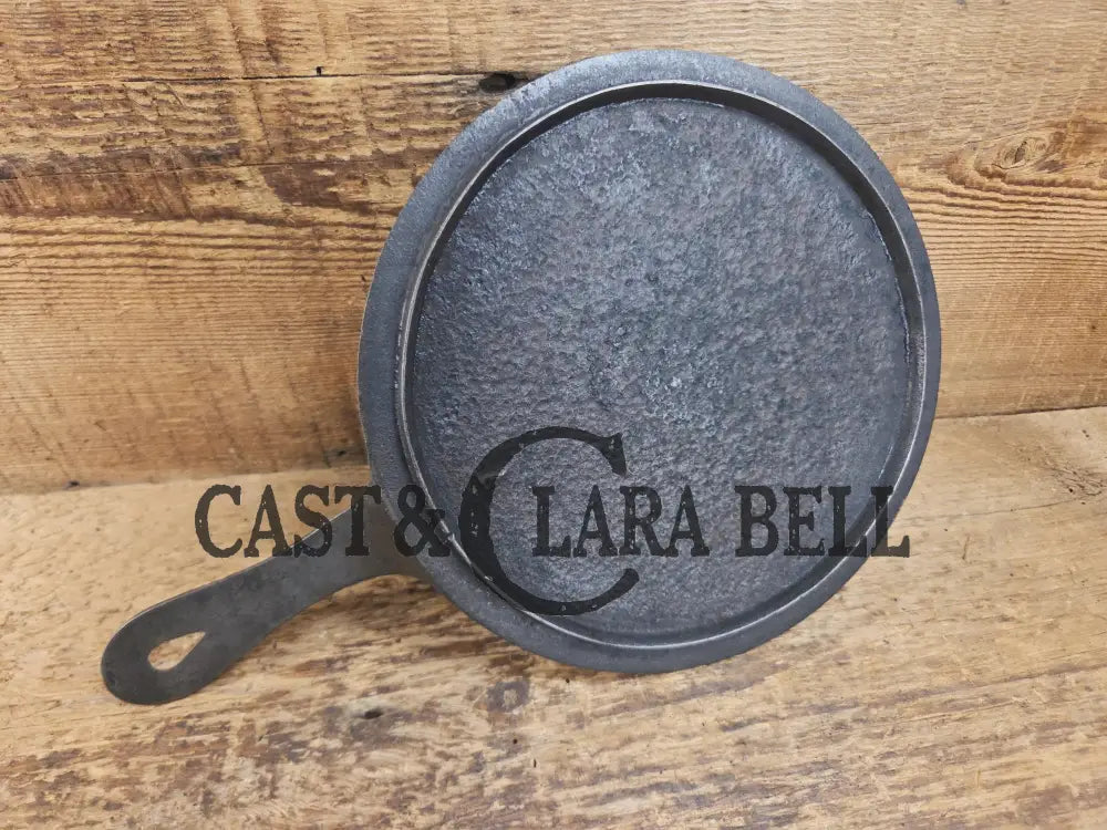 Piece of American history. Late 1800’s antique #7 Round Cast Iron Stove Eye Griddle. Elegant and hard working. SC24