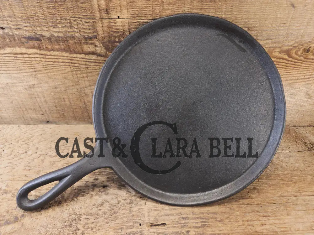 Piece of American history. Late 1800’s antique Gate marked Round Cast Iron Stove Eye Griddle. Elegant and hard working.