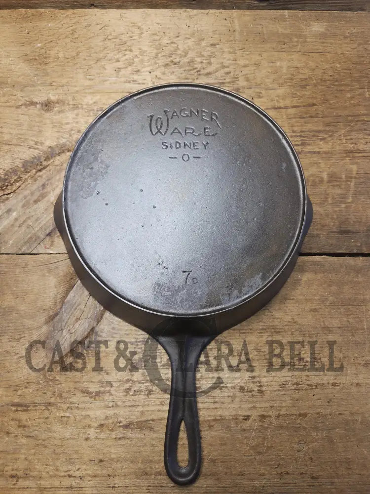 Priced to Sell! 1920βs Era Wagner Ware Sidney O. #7D Skillet with Heat Ring. Great value because of small pitted area