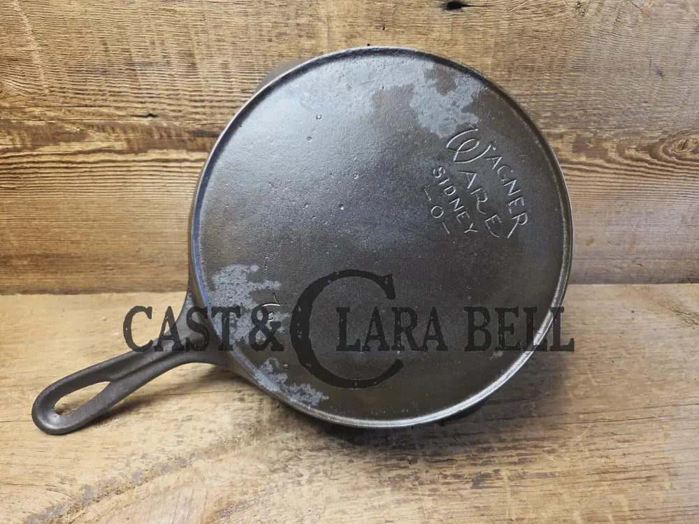 Priced to Sell! 1920’s Era Wagner Ware Sidney O. #7D Skillet with Heat Ring. Great value because of small pitted area