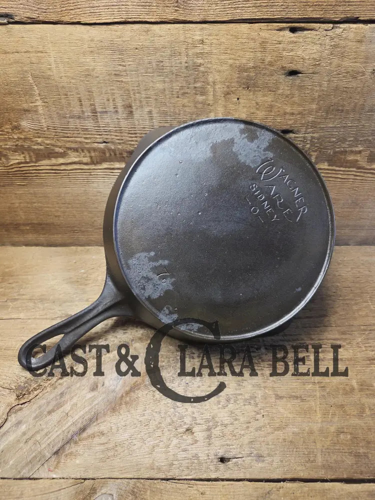 Priced to Sell! 1920’s Era Wagner Ware Sidney O. #7D Skillet with Heat Ring. Great value because of small pitted area