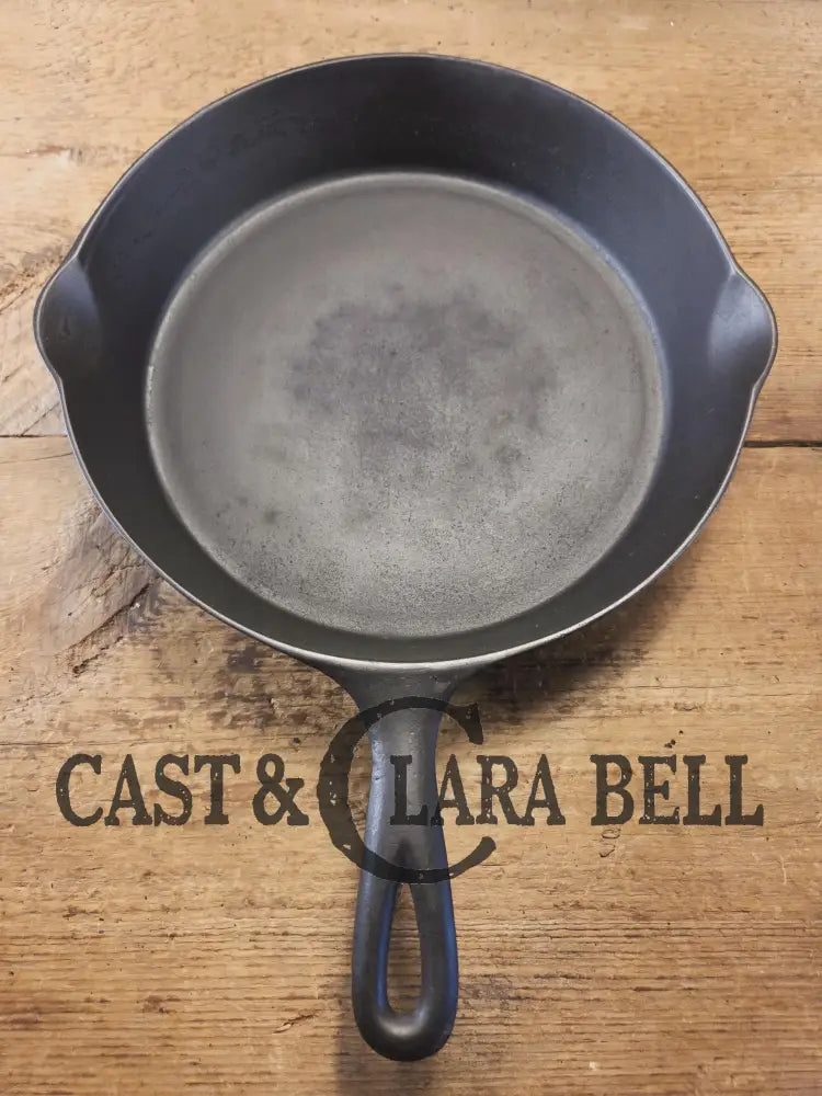 Priced to Sell! 1920’s Favorite Piqua Ware No. 9 B cast iron Skillet with Heat Ring and ’Smiley’ Logo. Gorgeous skillet