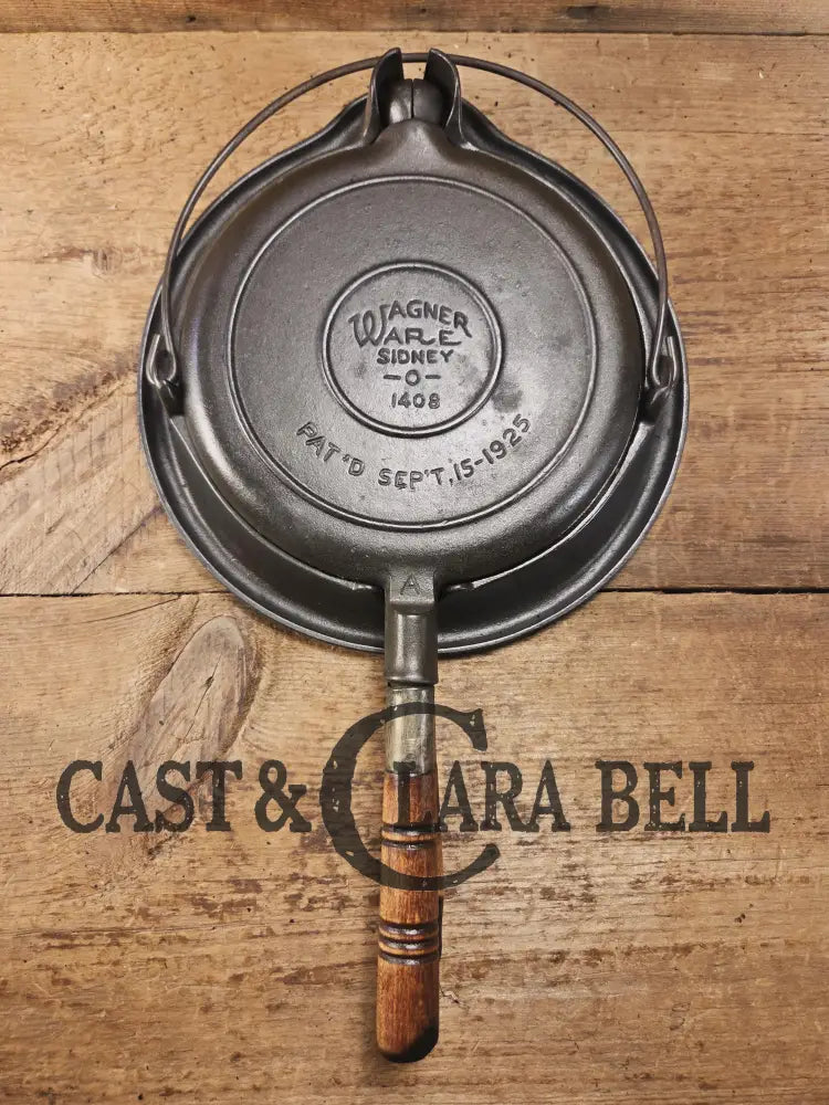 Priced to Sell and tougher to find 1920โs Early Wagner Ware Stylized logo 1408 #8 Waffle Iron with short Base! Waffle