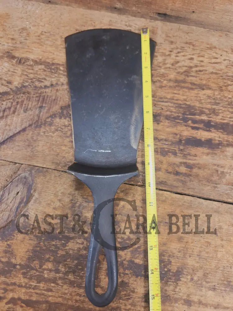 Show stopper. Custom made one of a kind Griswold Erie 3rd Series #9 spatula! A high value collectors pan kept alive as