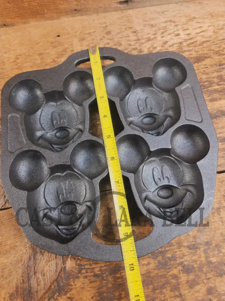 So cool! Lodge made Mickey Mouse Gem Pan. Makes great mini cakes! - Bakeware